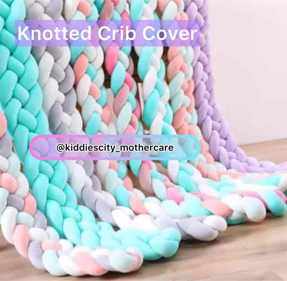 Knitted cot bumper