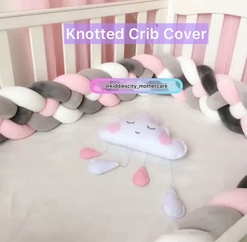 Knitted cot bumper