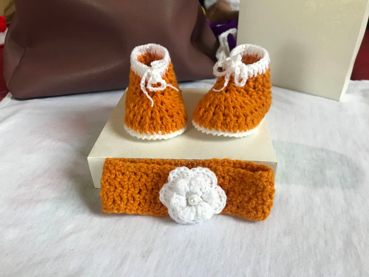 Gold and white crochet shoes for babies