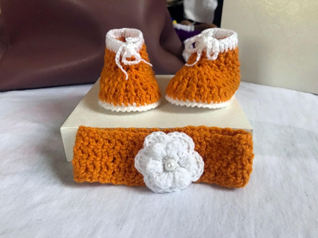 Gold and white crochet shoes for babies