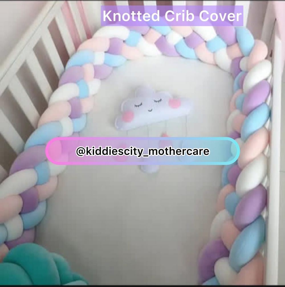 Knitted cot bumper